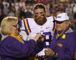 He was an avid footballer in Louisiana State University.